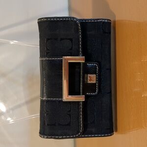 Black Liz Claiborne wallet with gold accents.
